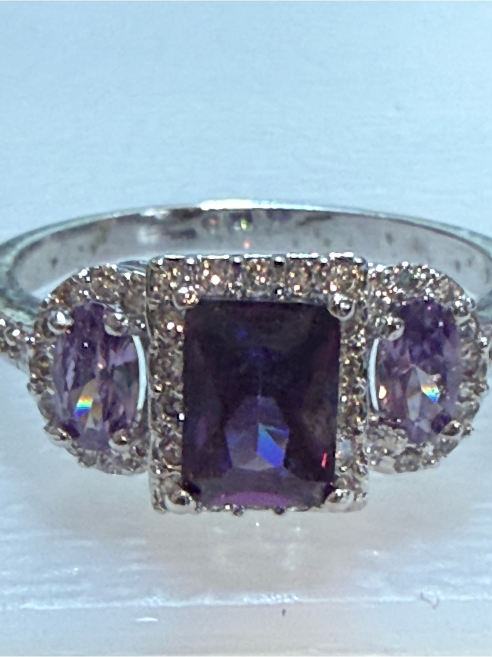 Sterling Purple Three-Stone Halo Ring with Center Emerald Cut Stone untested